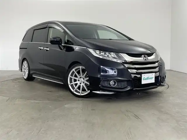 ホンダ オデッセイ アブソルート 兵庫県 2013(平25)年 8万km プレミアムヴィーナスブラックP ・純正ナビ/CD/DVD/BT/USB/HDMI/フルセグTV/・バックカメラ/・クルーズコントロール/・安心パッケージ/・サイドエアバッグシステム/・サイドカーテンエアバッグシステム/・EBD（電子制御制動力配分システム）/・エマージェンシーストップシグナル/・２列目プレミアムクレードルシート/・コンフォートビューパッケージ/・両側パワースライドドア/・ビルトインETC/・前方ドライブレコーダー/・アイドリングストップ/・ECONモード/・横滑り防止装置/・クリアランスソナー/・社外レーダー/・革巻きステアリング/・ステアリングリモコン/・LEDオートライト/・フォグランプ/・純正フロアマット/・社外１９インチアルミホイール/・純正アルミホイール付きスタッドレスタイヤ/・サマータイヤ（ホイールなし）/・TEIN車高調/・純正車高調/・後席エアコン/・パドルシフト/・電動格納ミラー/・ウィンカーミラー/・スマートキー/・スペアキー/・プッシュスタート