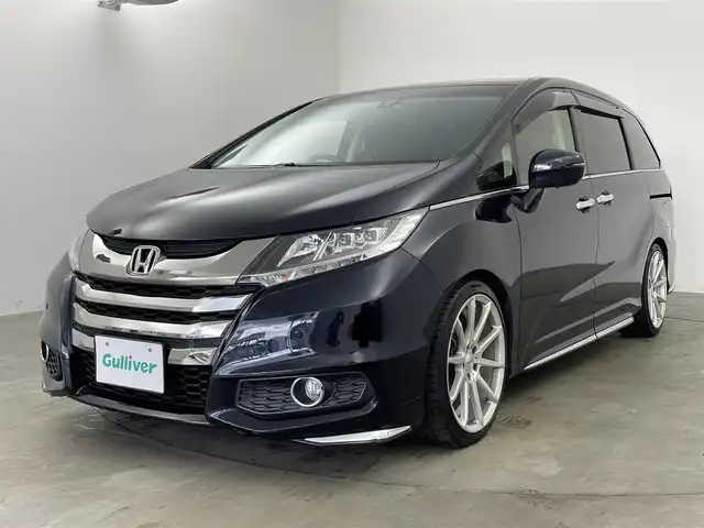 ホンダ オデッセイ アブソルート 兵庫県 2013(平25)年 8万km プレミアムヴィーナスブラックP ・純正ナビ/CD/DVD/BT/USB/HDMI/フルセグTV/・バックカメラ/・クルーズコントロール/・安心パッケージ/・サイドエアバッグシステム/・サイドカーテンエアバッグシステム/・EBD（電子制御制動力配分システム）/・エマージェンシーストップシグナル/・２列目プレミアムクレードルシート/・コンフォートビューパッケージ/・両側パワースライドドア/・ビルトインETC/・前方ドライブレコーダー/・アイドリングストップ/・ECONモード/・横滑り防止装置/・クリアランスソナー/・社外レーダー/・革巻きステアリング/・ステアリングリモコン/・LEDオートライト/・フォグランプ/・純正フロアマット/・社外１９インチアルミホイール/・純正アルミホイール付きスタッドレスタイヤ/・サマータイヤ（ホイールなし）/・TEIN車高調/・純正車高調/・後席エアコン/・パドルシフト/・電動格納ミラー/・ウィンカーミラー/・スマートキー/・スペアキー/・プッシュスタート