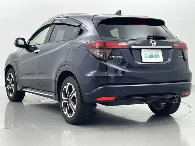 ホンダ ヴェゼル ハイブリッド Z ホンダセンシング 熊本県 2019(平31)年 6.5万km ミッドナイトブルービームM 純正SDナビVXM-195VFEC(Bluetooth/CD/DVD・フルセグ)/ドライブレコーダー/バックカメラ/クルーズコントロール/追従機能/ビルドインETC/前席シートヒーター/衝突軽減ブレーキ/レーンキープアシスト/横滑り防止/ハーフレザーシート/フロントワイパーデアイサー/ルーフレール/USBポート/オートライト/LEDオートライト/純正フロアマット/純正17インチAW/プッシュスタート/スマートキー/保証書/取扱説明書