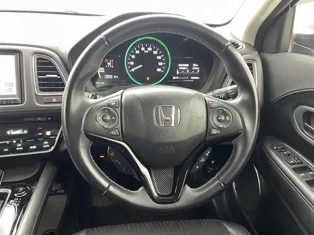 ホンダ ヴェゼル ハイブリッド Z ホンダセンシング 熊本県 2019(平31)年 6.5万km ミッドナイトブルービームM 純正SDナビVXM-195VFEC(Bluetooth/CD/DVD・フルセグ)/ドライブレコーダー/バックカメラ/クルーズコントロール/追従機能/ビルドインETC/前席シートヒーター/衝突軽減ブレーキ/レーンキープアシスト/横滑り防止/ハーフレザーシート/フロントワイパーデアイサー/ルーフレール/USBポート/オートライト/LEDオートライト/純正フロアマット/純正17インチAW/プッシュスタート/スマートキー/保証書/取扱説明書