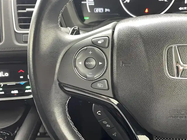 ホンダ ヴェゼル ハイブリッド Z ホンダセンシング 熊本県 2019(平31)年 6.5万km ミッドナイトブルービームM 純正SDナビVXM-195VFEC(Bluetooth/CD/DVD・フルセグ)/ドライブレコーダー/バックカメラ/クルーズコントロール/追従機能/ビルドインETC/前席シートヒーター/衝突軽減ブレーキ/レーンキープアシスト/横滑り防止/ハーフレザーシート/フロントワイパーデアイサー/ルーフレール/USBポート/オートライト/LEDオートライト/純正フロアマット/純正17インチAW/プッシュスタート/スマートキー/保証書/取扱説明書