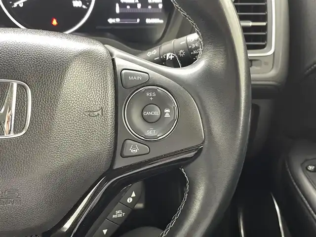 ホンダ ヴェゼル ハイブリッド Z ホンダセンシング 熊本県 2019(平31)年 6.5万km ミッドナイトブルービームM 純正SDナビVXM-195VFEC(Bluetooth/CD/DVD・フルセグ)/ドライブレコーダー/バックカメラ/クルーズコントロール/追従機能/ビルドインETC/前席シートヒーター/衝突軽減ブレーキ/レーンキープアシスト/横滑り防止/ハーフレザーシート/フロントワイパーデアイサー/ルーフレール/USBポート/オートライト/LEDオートライト/純正フロアマット/純正17インチAW/プッシュスタート/スマートキー/保証書/取扱説明書