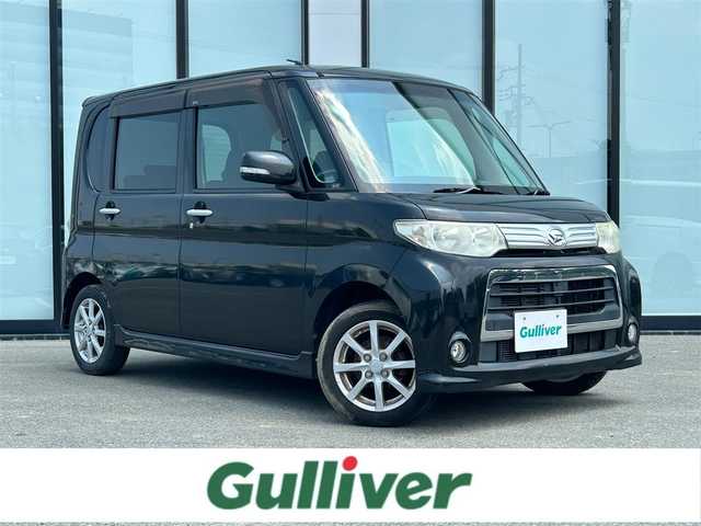 ダイハツ タント カスタム X 大阪府 2011(平23)年 18.1万km ブラックマイカメタリック 社外9インチナビ /ワンセグTV/ETC/CD/DVD/片側電動スライドドア /純正14インチアルミホイール /キセノンライト/スマートキー /ベンチシート/横滑り防止装置
