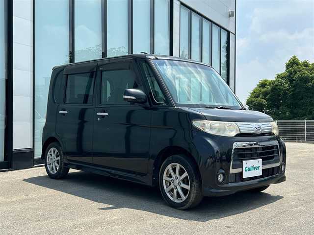 ダイハツ タント カスタム X 大阪府 2011(平23)年 18.1万km ブラックマイカメタリック 社外9インチナビ /ワンセグTV/ETC/CD/DVD/片側電動スライドドア /純正14インチアルミホイール /キセノンライト/スマートキー /ベンチシート/横滑り防止装置