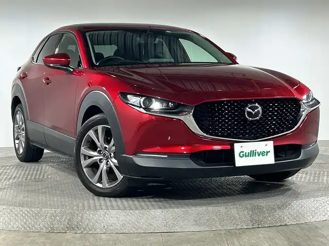 マツダ ＣＸ－３０ 20S Lパッケージ 神奈川県 2019(令1)年 3.1万km ソウルレッドクリスタルM マツダコネクトナビ/SD　DVD　フルセグ　AM　FM　Bluetooth　USB　メモリーオーディオ　HDMI/全方位モニター/BOSEプレミアムサウンド/追従クルーズコントロール/前後ソナー/前後側方接近車両検知/アイドリングストップ/スマートブレーキサポート/アダプティブLEDヘッドライト/ディスタンス＆スピードアラート/パワーバックドア/レザーシート/D席パワーシート/D席メモリーシート/前席シートヒーター/レザーシート/ステアリングヒーター/革巻きステアリング/ドライバーモニタリング/ビルトインETC/電子パーキングブレーキ/ヘッドアップディスプレイ/スマホ連携/スマートキー/プッシュスタート/純正18インチアルミホイル/純正リアスポイラー/デイタイムランニングライト