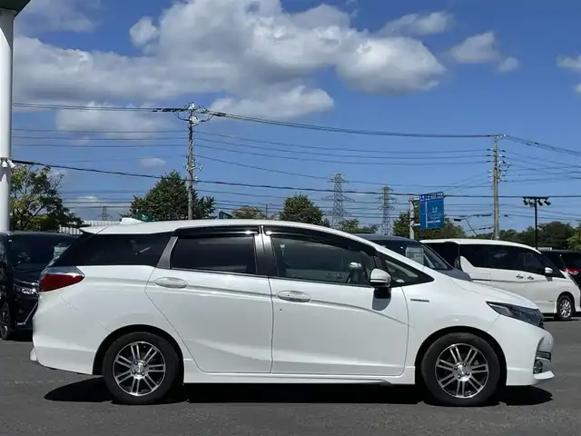 ホンダ シャトル ハイブリッド X ホンダセンシング 栃木県 2018(平30)年 6万km ホワイトオーキッドパール ワンオーナー/社外メモリナビ/　AM/FM/SD/DVD/BT/フルセグ/ホンダセンシング/衝突被害軽減ブレーキ/横滑り防止装置/アダプティブクルーズコントロール/レーンキープ/バックカメラ/ビルトインETC/ドライブレコーダー/アイドリングストップ/ECOMODE/Sモード/シートヒーター/ハーフレザー/革巻きステアリング/ステアリングリモコン/パドルシフト/MTモード付AT/レーダー探知機/プッシュスタート/スマートキー/LEDヘッドライト/オートライト/フォグランプ/電動格納ミラー/ウィンカーミラー/純正フロアマット/ドアバイザー/スペアキー