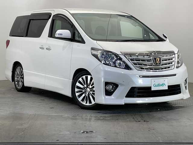 トヨタ アルファード 240S タイプゴールドⅡ 栃木県 2014(平26)年 3.1万km ホワイトパールクリスタルシャイン アルパイン製ナビ(EX1000)/(フルセグTV・Bluetooth・CD・SD)/バックカメラ/フリップダウンモニター/ドライブレコーダー/前後コーナーセンサー/オットマン/ウォークスルー/電動リアゲート/社外マフラー/ローダウン/両側パワースライドドア/ビルトインETC/スマートキー/スペアキー1本/HIDヘッドライト/オートライト/ドアバイザー/取扱説明書