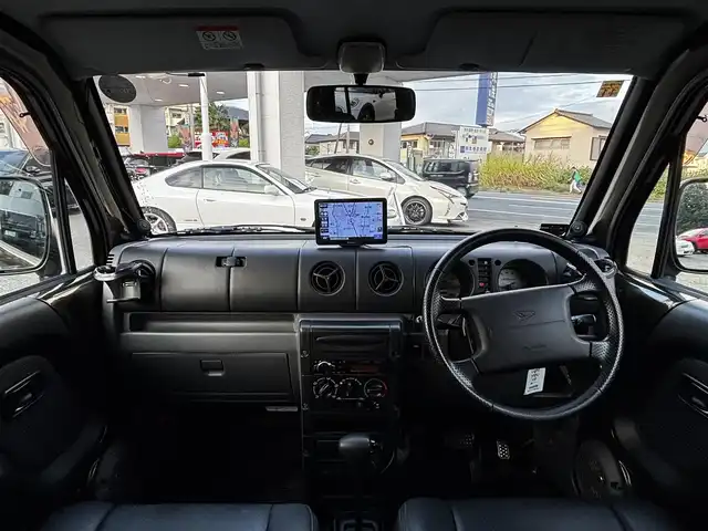 ダイハツ ネイキッド ターボ Gパッケージ 熊本県 2000(平12)年 8.7万km ダークオリーブマイカ ターボ/4WD/社外オーディオ/【Bluetooth/CD/AM/FM/AUX】/ポータブルナビ（CN-G1400VD）/ETC/革調シートカバー/14インチアルミホイール/純正フロアマット/ドアバイザー/リモコンキー