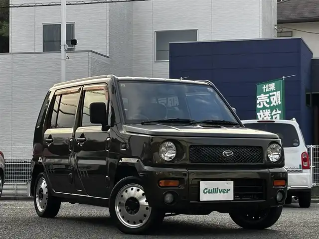 ダイハツ ネイキッド ターボ Gパッケージ 熊本県 2000(平12)年 8.7万km ダークオリーブマイカ ターボ/4WD/社外オーディオ/【Bluetooth/CD/AM/FM/AUX】/ポータブルナビ（CN-G1400VD）/ETC/革調シートカバー/14インチアルミホイール/純正フロアマット/ドアバイザー/リモコンキー