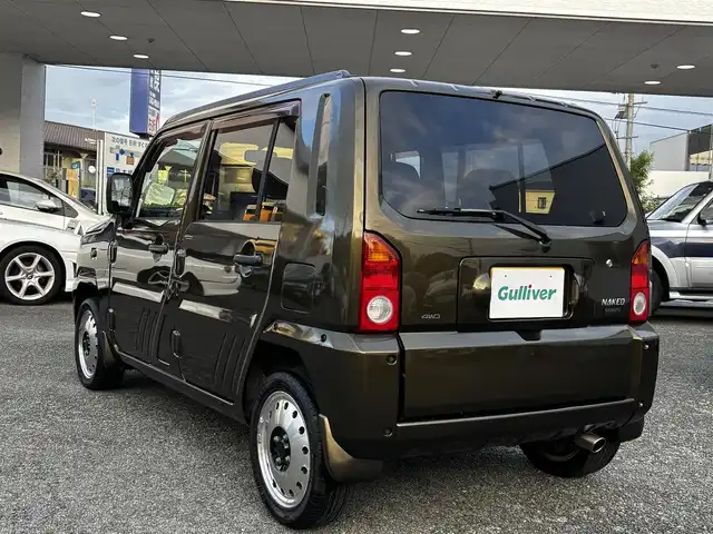 ダイハツ ネイキッド ターボ Gパッケージ 熊本県 2000(平12)年 8.7万km ダークオリーブマイカ ターボ/4WD/社外オーディオ/【Bluetooth/CD/AM/FM/AUX】/ポータブルナビ（CN-G1400VD）/ETC/革調シートカバー/14インチアルミホイール/純正フロアマット/ドアバイザー/リモコンキー