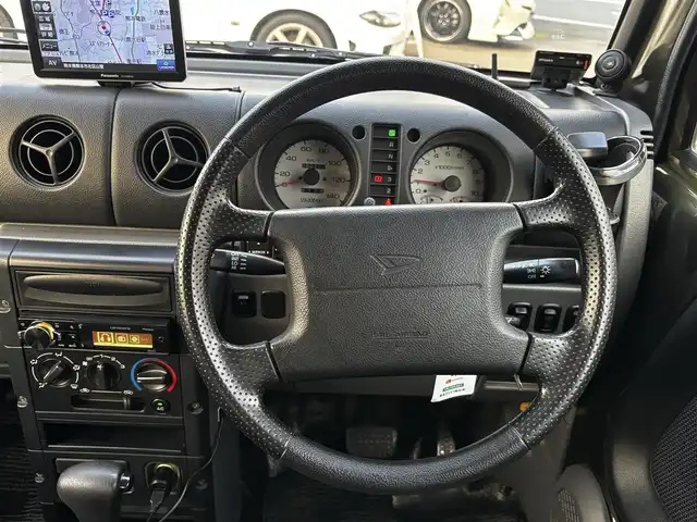 ダイハツ ネイキッド ターボ Gパッケージ 熊本県 2000(平12)年 8.7万km ダークオリーブマイカ ターボ/4WD/社外オーディオ/【Bluetooth/CD/AM/FM/AUX】/ポータブルナビ（CN-G1400VD）/ETC/革調シートカバー/14インチアルミホイール/純正フロアマット/ドアバイザー/リモコンキー