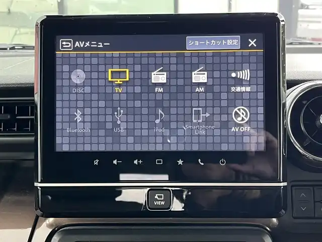 スズキ スペーシア ギア マイスタイル 奈良県 2023(令5)年 1.7万km シフォンアイボリーメタリック ワンオーナー/純正9インチナビ/（フルセグ/BT/CD/DVD）/レーダークルーズコントロール/アラウンドビューモニター/後方コーナーセンサー/衝突軽減システム/レーンキープアシスト/両側パワースライドドア/前席シートヒーター/後席サンシェード/前後ドライブレコーダー（ZDR035）/ETC/保証書/取り扱い説明書/スペアキーX1