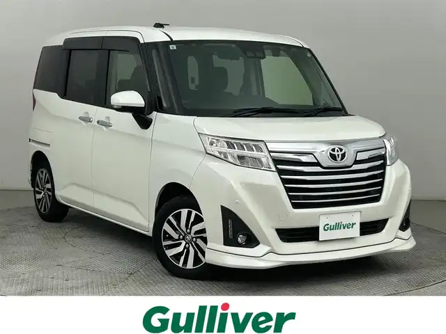 トヨタ ルーミー カスタムG 道央・札幌 2019(令1)年 0.7万km パールホワイトⅢ ・４WD/・寒冷地仕様/・社外ＳＤナビゲーション（AVN-R9W）/　ＣＤ／ＤＶＤ／ＳＤ／フルセグ／ＢＴ/・バックカメラ/・ETC/・両側パワースライドドア/・純正エンジンスターター/・前後コーナーセンサー/・横滑り防止装置/・衝突軽減ブレーキ/・先行車発進通知/・前後コーナーセンサー/・社外ドライブレコーダー前方録画/・クルーズコントロール/・前席シートヒーター/・純正AW14インチ/・スマートキー/・プッシュスタート/・純正フロアマット/・ウォークスルー/・オートライト/・LEDヘッドライト/・フロントフォグランプ/・レーンキープアシスト/・２列目サンシェード/・ワイパーデアイサー/・ステアリングスイッチ