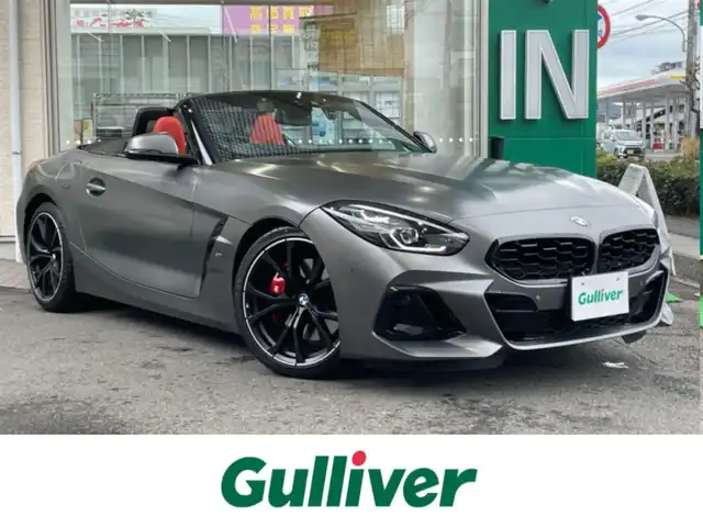 ＢＭＷ ＢＭＷ Ｚ４ M40i 高知県 2023(令5)年 0.4万km ガンＭ 登録時走行距離3703km/ワンオーナー/カラーC37:フローズングレーIIメタリック/Mスポーツブレーキ(レッドキャリパー)/Harman/kardonサウンド/BMWライブ・コックピット/メーカーオプションナビ/フルセグTV/バックカメラ/ドライビング・アシスト/　・ACC／アクティブ・クルーズ・コントロール/　・レーン・ディパーチャー・ウォーニング/　・レーン・チェンジ・ウォーニング/　・ クロス・トラフィック・ウォーニング（リヤ）/　・前車接近警告機能3/　・後車衝突警告機能/　・衝突回避・被害軽減ブレーキ/イノベーション・パッケージ/　・アダプティブLEDヘッドライト/　・ハイビーム・アシスタント/　・BMWヘッドアップ・ディスプレイ/マグマ・レッド（デザイン・ステッチ付）レザーシート/前席パワーシート/前席シートヒーター/前席シートメモリー/プッシュスタート/スマートキー/スペアキー/フルオートマチック・リトラクタブル・ソフトトップ/ドライブレコーダー/ビルトインETC/純正フロアマット/新車保証書/整備記録簿/取扱説明書