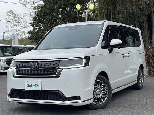 ホンダ ステップワゴン スパーダ eHEV 京都府 2022(令4)年 2万km プラチナホワイトパール ワンオーナー/純正ナビ/フルセグTV/Bluetooth Audio/CD/DVD/バックカメラ/レーダークルーズコントロール/両側パワースライドドア/パドルシフト/ビルトインETC/前後ドラレコ/パワーバックドア/シートヒーター(D.N席)/電動パーキングブレーキ/ステアリングスイッチ/オートライト/電格ウィンカーミラー/オートリトラクタブルミラー/プッシュスタート/純正ドアバイザー/純正フロアマット/保証書/取説/スペアキー