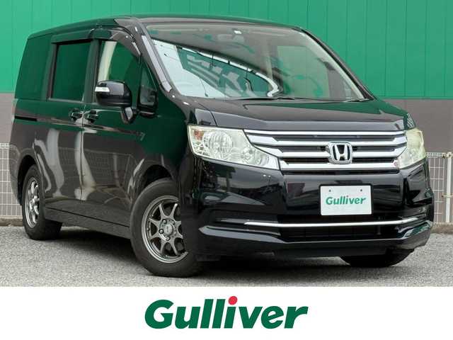 ホンダ ステップワゴン G コンフォートセレクション 千葉県 2012(平24)年 8.1万km クリスタルブラックパール 純正HDDナビ/フルセグテレビ/バックカメラ/フリップダウンモニター/両側パワースライドドア/クルーズコントロール/純正フロアマット/アイドリングストップ/横滑り防止装置/ETC