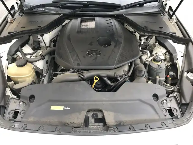 日産 スカイライン 200GT－t 栃木県 2014(平26)年 7.3万km クリスタルホワイトパール 株)IDOMが運営する【じしゃロン小山店】の自社ローン専用車両になります。こちらは現金またはオートローンご利用時の価格です。自社ローンご希望の方は別途その旨お申付け下さい//禁煙車/純正フルセグナビ/（CD/DVD/AM/FMラジオ）/(Bluetooth)/スマートキー/プッシュスタート/バックカメラ/クルーズコントロール/ＥＴＣ/パワーシート/アイドリングストップ/ステアリングリモコン/電動格納ドアミラー/パワーウインドウ/防眩ミラー/オートライト