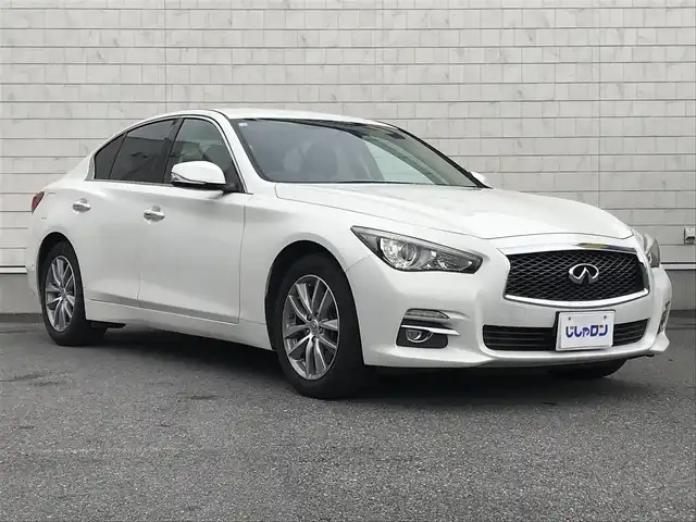 日産 スカイライン 200GT－t 栃木県 2014(平26)年 7.3万km クリスタルホワイトパール 株)IDOMが運営する【じしゃロン小山店】の自社ローン専用車両になります。こちらは現金またはオートローンご利用時の価格です。自社ローンご希望の方は別途その旨お申付け下さい//禁煙車/純正フルセグナビ/（CD/DVD/AM/FMラジオ）/(Bluetooth)/スマートキー/プッシュスタート/バックカメラ/クルーズコントロール/ＥＴＣ/パワーシート/アイドリングストップ/ステアリングリモコン/電動格納ドアミラー/パワーウインドウ/防眩ミラー/オートライト