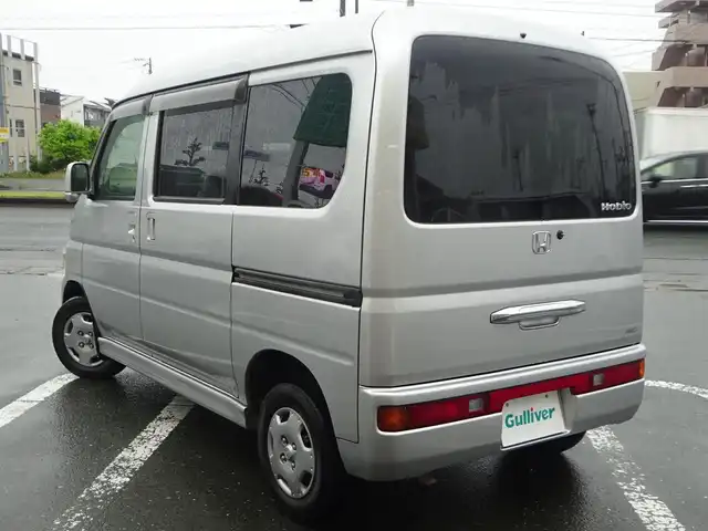 ホンダ バモス ホビオ G 静岡県 2013(平25)年 4.3万km アラバスターシルバーメタリック ワンオーナー・禁煙車/4WD/carrozzeria SDナビ/（CD/DVD/SD/BT）/Yupiteru 前後ドライブレコーダー/ETC/前席パワーウィンドウ/両側スライドドア/リモコンキー/純正フロアマット/バイザー/保証書、取扱説明書