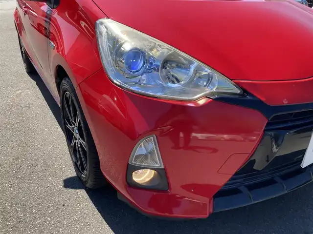 トヨタ アクア G 静岡県 2013(平25)年 7.6万km スーパーレッドⅤ 純正メモリーナビ(NSCP-W62)/　AM FM CD Bluetooth ワンセグ/LEDオートヘッドランプ/革巻きステアリング/ステアリングスイッチ/スマートキー＆プッシュスタート/社外16インチアルミホイール/ECO/EV MODE/スポーツペダル/純正ラゲッジマット/純正フロアマット/レザー調シートカバー/ワンオーナー/ETC/バックモニター