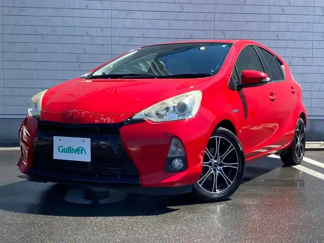 トヨタ アクア G 静岡県 2013(平25)年 7.6万km スーパーレッドⅤ 純正メモリーナビ(NSCP-W62)/　AM FM CD Bluetooth ワンセグ/LEDオートヘッドランプ/革巻きステアリング/ステアリングスイッチ/スマートキー＆プッシュスタート/社外16インチアルミホイール/ECO/EV MODE/スポーツペダル/純正ラゲッジマット/純正フロアマット/レザー調シートカバー/ワンオーナー/ETC/バックモニター