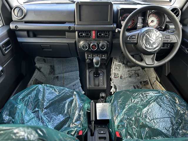 スズキ ジムニー ノマド FC 道東・釧路十勝 2025(令7)年 0.1千km Ｄグリーン 未使用/ワンオーナー/4WD/デュアルカメラブレーキサポート/・衝突被害軽減ブレーキ/・後退時ブレーキサポート/・誤発進抑制機能/・後方誤発進抑制機能/・アクティブクルーズコントロール/ステアリングスイッチ/アイドリングストップ/スマートキー/スペアキー/シートヒーター（D+N席）/背面タイヤ/純正AWサマータイヤ/横滑り防止装置/コーナーセンサー/レーンキープアシスト/オートライト/ダウンヒルアシストコントロール/純正LEDヘッドライト/保証書/取扱説明書/記録簿