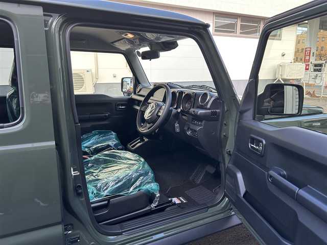 スズキ ジムニー ノマド FC 道東・釧路十勝 2025(令7)年 0.1千km Ｄグリーン 未使用/ワンオーナー/4WD/デュアルカメラブレーキサポート/・衝突被害軽減ブレーキ/・後退時ブレーキサポート/・誤発進抑制機能/・後方誤発進抑制機能/・アクティブクルーズコントロール/ステアリングスイッチ/アイドリングストップ/スマートキー/スペアキー/シートヒーター（D+N席）/背面タイヤ/純正AWサマータイヤ/横滑り防止装置/コーナーセンサー/レーンキープアシスト/オートライト/ダウンヒルアシストコントロール/純正LEDヘッドライト/保証書/取扱説明書/記録簿