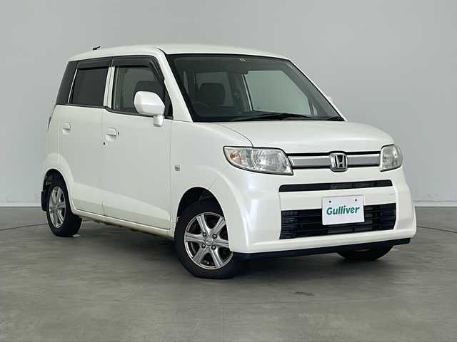 ホンダ ゼスト D 新潟県 2010(平22)年 5.3万km プレミアムホワイトパール 純正オーディオ/（CD/FM/AM)/純正フロアマット/Wエアバッグ/AAC/ドアバイザー/ABS/ 取扱説明書