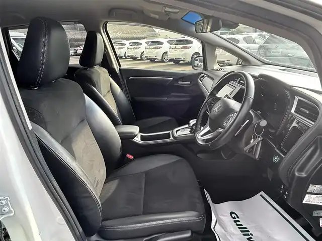 ホンダ シャトル ハイブリッド Z 山形県 2015(平27)年 7.3万km ホワイトオーキッドパール シティブレーキアクティブシステム/純正SDナビ/　　【CD DVD BT フルセグ USB AUX】/バックカメラ/クルーズコントロール/LEDオートヘッドライト/ハーフレザーシート/シートヒーター/純正16インチアルミホイール/ドライブレコーダー/アイドリングストップ/ステアリングスイッチ/パドルシフト/電動格納ウィンカーミラー/フォグランプ/スマートキー×2/ETC