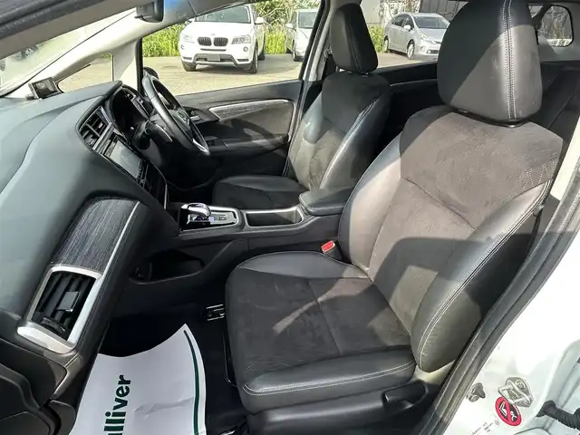 ホンダ シャトル ハイブリッド Z 山形県 2015(平27)年 7.3万km ホワイトオーキッドパール シティブレーキアクティブシステム/純正SDナビ/　　【CD DVD BT フルセグ USB AUX】/バックカメラ/クルーズコントロール/LEDオートヘッドライト/ハーフレザーシート/シートヒーター/純正16インチアルミホイール/ドライブレコーダー/アイドリングストップ/ステアリングスイッチ/パドルシフト/電動格納ウィンカーミラー/フォグランプ/スマートキー×2/ETC