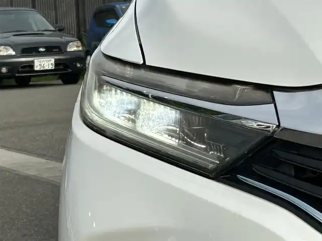 ホンダ シャトル ハイブリッド Z 山形県 2015(平27)年 7.3万km ホワイトオーキッドパール シティブレーキアクティブシステム/純正SDナビ/　　【CD DVD BT フルセグ USB AUX】/バックカメラ/クルーズコントロール/LEDオートヘッドライト/ハーフレザーシート/シートヒーター/純正16インチアルミホイール/ドライブレコーダー/アイドリングストップ/ステアリングスイッチ/パドルシフト/電動格納ウィンカーミラー/フォグランプ/スマートキー×2/ETC