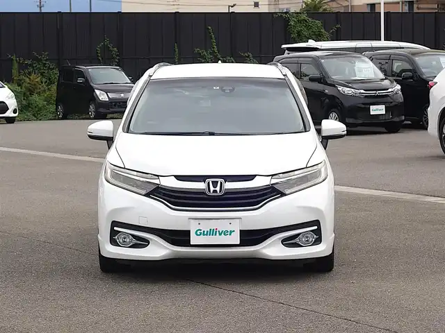 ホンダ シャトル ハイブリッド Z 山形県 2015(平27)年 7.3万km ホワイトオーキッドパール シティブレーキアクティブシステム/純正SDナビ/　　【CD DVD BT フルセグ USB AUX】/バックカメラ/クルーズコントロール/LEDオートヘッドライト/ハーフレザーシート/シートヒーター/純正16インチアルミホイール/ドライブレコーダー/アイドリングストップ/ステアリングスイッチ/パドルシフト/電動格納ウィンカーミラー/フォグランプ/スマートキー×2/ETC