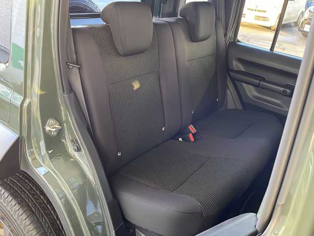 スズキ ジムニー ノマド FC 愛媛県 2025(令7)年 0.1万km未満 緑 ４WD/ワンオーナー/スマートキー/プッシュスタート/前席シートヒーター/レーダークルーズコントロール/衝突軽減ブレーキ/レーンキープアシスト/コーナーセンサー/ステアリングスイッチ/背面タイヤ/オートライト/オートハイビーム/電動格納ミラー/ライトレベライザー/ヘッドライトウォッシャー