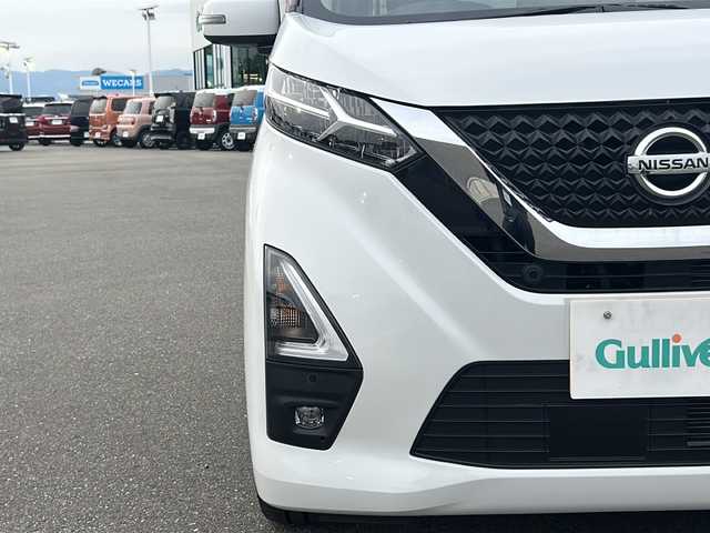 日産 デイズ HWS G ターボ プロパイロットED 佐賀県 2021(令3)年 5.3万km ホワイトパール /純正9インチSDナビ BT フルセグTV CD DVD//アラウンドビューモニター//プロパイロット/追従型クルーズコントロール/レーンアシスト/ハンドル支援//エマージェンシーブレーキ//純正15インチアルミホイール//純正フロアマット//ETC2.0//革巻きステアリング//ステアリングリモコン//電子パーキング//オートホールド//スマートキー//LEDヘッドライト//フォグライト