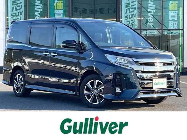 トヨタ ノア Si ダブルバイビーⅡ 岡山県 2019(平31)年 6.2万km ブラッキッシュアゲハガラスフレーク 登録時走行距離61665km/純正10インチナビ【AM/FM/BT/フルセグTV】/バックカメラ/両側パワースライドドア/ETC2.0/ドライブレコーダー/ハーフレザーシート/クルーズコントロール/衝突被害軽減システム/レーンキープアシスト/コーナーセンサー/横滑防止装置/純正LEDヘッドライト/オートライト/オートマチックハイビーム/MTモード付きAT/アイドリングストップ/純正アルミホイール 16インチ/ドアバイザー/純正フロアマット