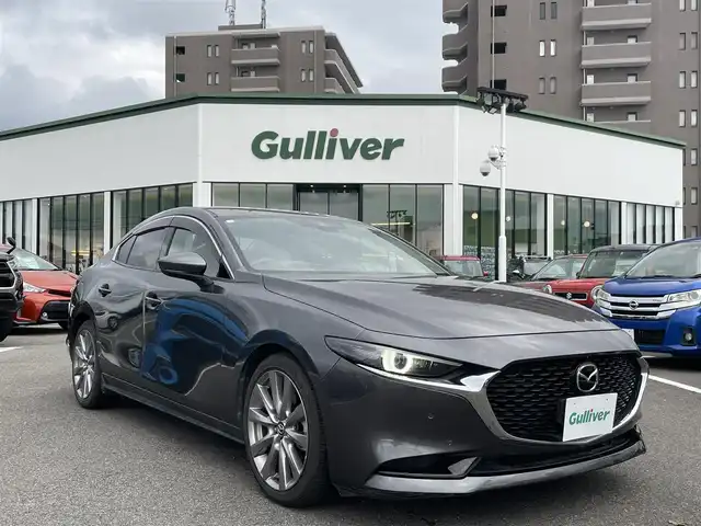 マツダ マツダ３セダン XD Lパッケージ 長崎県 2020(令2)年 7.5万km マシーングレープレミアムM 全方位カメラ/純正ナビ/衝突軽減ブレーキ/ブラインドスポットモニター/黒レザーシート/運転席パワーシート/ドライブレコーダー前後/ETC/パドルシフト/シートメモリー/レーダークルーズコントロール/シートヒーター/クリアランスソナー/ステアリングスイッチ/ハンドルヒーター/オートライト/LEDヘッドライト/スペアキー
