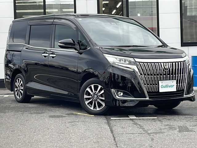 トヨタ エスクァイア Gi プレミアムパッケージ 山口県 2018(平30)年 7.9万km ブラック ワンオーナー/純正12.1インチフリップダウンモニター（V12T-R68C）/純正10インチナビ/・フルセグテレビ/・Bluetooth機能/・CD/DVD再生/・AM/FMラジオ/・HDMI/・USB入力端子/・交通情報/バックカメラ/両側パワースライドドア/スマートキー/プッシュスタート/D/N席シートヒーター/ステアリングヒーター/ETC2.0 /ドライブレコーダー/オートマチックハイビーム/保証書/取扱説明書/純正15インチアルミホイール/フォグライト/純正LEDヘッドライト/Toyota Safty Sense/・プリクラッシュセーフティ/・レーンディバーチャーアラート/先行車発進告知機能/盗難防止装置