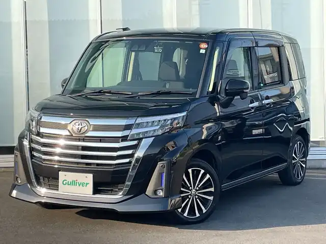 トヨタ ルーミー カスタムG－T 神奈川県 2023(令5)年 1.7万km ブラックマイカメタリック 純正９型ナビ/フルセグ/Bluetooth/CD/DVD/USB/両側パワースライドドア　/レーダークルーズコントロール/スマートアシスト　/バックカメラ　/コーナーセンサー　/シートヒーター　/ビルドインETC　/ドライブレコーダー　/LEDヘッドライト　/フォグライト　/オートライト/スマートキー/プッシュスタート/スペアキー/純正フロアマット/純正アルミホイール/ABS/横滑り防止装置/レーンキープアシスト