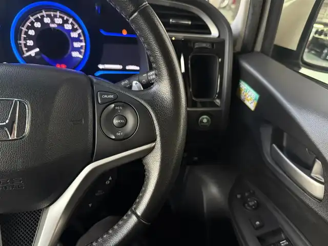 ホンダ シャトル ハイブリッド X 京都府 2015(平27)年 11.1万km ホワイトオーキッドパール 純正インターナビ、Bluetooth/CD/DVD/USB/HDMI/パドルシフト/LEDヘッドランプ/ビルトインETC/ステアリングスイッチ/クルーズコントロール