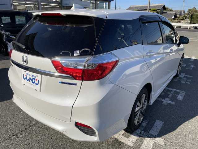 ホンダ シャトル ハイブリッド X 兵庫県 2015(平27)年 11.1万km ホワイトオーキッドパール 【(株)IDOMが運営する【じしゃロン姫路店】の自社ローン対象車両になります。こちらは現金ご利用時の価格です。自社ローンご希望の方は別途その旨お申付け下さい。】/純正インターナビ、Bluetooth/CD/DVD/USB/HDMI/パドルシフト/LEDヘッドランプ/ビルトインETC/ステアリングスイッチ/クルーズコントロール