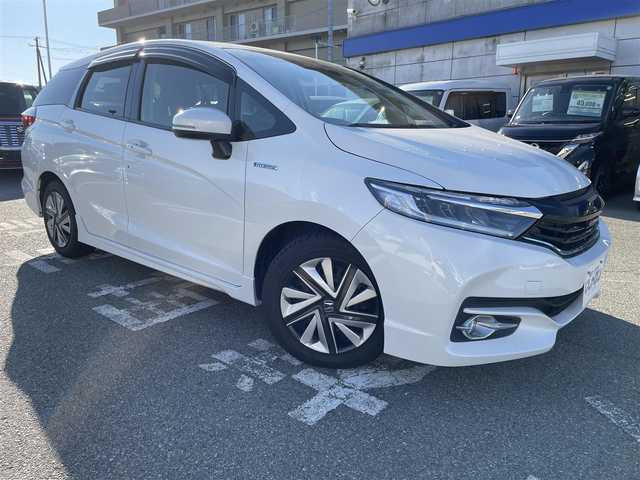 ホンダ シャトル ハイブリッド X 兵庫県 2015(平27)年 11.1万km ホワイトオーキッドパール 【(株)IDOMが運営する【じしゃロン姫路店】の自社ローン対象車両になります。こちらは現金ご利用時の価格です。自社ローンご希望の方は別途その旨お申付け下さい。】/純正インターナビ、Bluetooth/CD/DVD/USB/HDMI/パドルシフト/LEDヘッドランプ/ビルトインETC/ステアリングスイッチ/クルーズコントロール