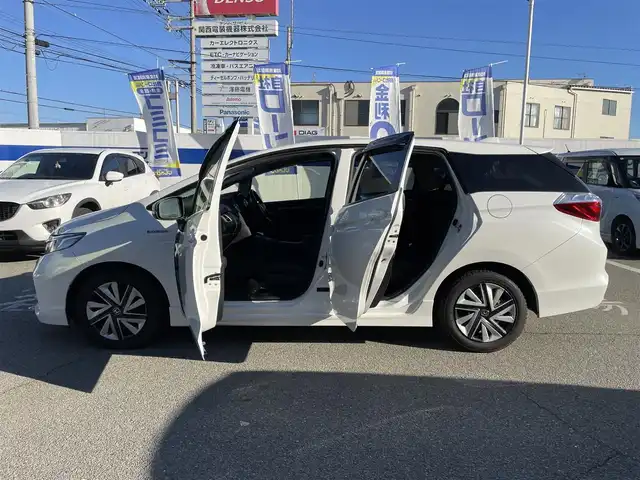 ホンダ シャトル ハイブリッド X 兵庫県 2015(平27)年 11.1万km ホワイトオーキッドパール 【(株)IDOMが運営する【じしゃロン姫路店】の自社ローン対象車両になります。こちらは現金ご利用時の価格です。自社ローンご希望の方は別途その旨お申付け下さい。】/純正インターナビ、Bluetooth/CD/DVD/USB/HDMI/パドルシフト/LEDヘッドランプ/ビルトインETC/ステアリングスイッチ/クルーズコントロール