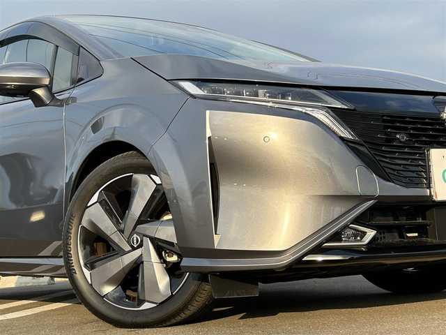 日産 オーラ G レザーエディション 佐賀県 2023(令5)年 0.7万km ダークメタルグレー ワンオーナー/プロパイロット/エマージェンシーブレーキ/アラウンドビューモニター/全方位運転支援システム/ハンドル支援/レーンアシスト/アダプティブクルーズコントロール/純正9インチメモリーナビゲーション/フルセグTV Bluetooth USB HDMI/革巻きステアリング/ステアリングリモコン/革シート/インテリキー/BOSSプレミアムサウンド/デジタルインナーミラー/置くだけ充電/純正ドライブレコーダー/ビルトインETC2.0/フロアマット/LEDオートヘッドライト/LEDフォグランプ/オートマチックハイビーム/純正17インチアルミホイール