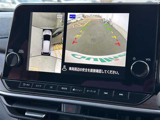日産 オーラ G レザーエディション 佐賀県 2023(令5)年 0.7万km ダークメタルグレー ワンオーナー/プロパイロット/エマージェンシーブレーキ/アラウンドビューモニター/全方位運転支援システム/ハンドル支援/レーンアシスト/アダプティブクルーズコントロール/純正9インチメモリーナビゲーション/フルセグTV Bluetooth USB HDMI/革巻きステアリング/ステアリングリモコン/革シート/インテリキー/BOSSプレミアムサウンド/デジタルインナーミラー/置くだけ充電/純正ドライブレコーダー/ビルトインETC2.0/フロアマット/LEDオートヘッドライト/LEDフォグランプ/オートマチックハイビーム/純正17インチアルミホイール