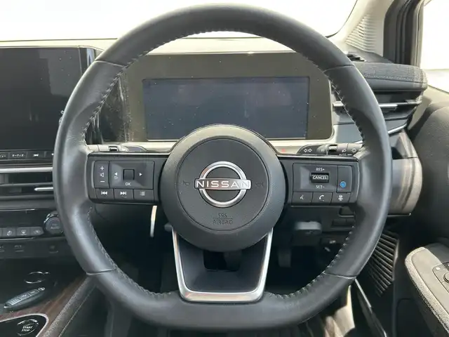 日産 オーラ G レザーエディション 佐賀県 2023(令5)年 0.7万km ダークメタルグレー プロパイロット/エマージェンシーブレーキ/全方位運転支援システム/・ハンドル支援/・レーンアシスト/インテリジェントクルーズコントロール/側方/後側方支援/ソナー/純正9インチメモリーナビゲーション/・アラウンドビューモニター/・フルセグTV/Bluetooth/USB/HDMI/革巻きステアリング/ステアリングリモコン/黒革シート/BOSEプレミアムサウンド/デジタルインナーミラー/置くだけ充電/純正ドライブレコーダー/ビルトインETC2.0/フロアマット/LEDオートヘッドライト/LEDフォグランプ/オートマチックハイビーム/純正17インチアルミホイール