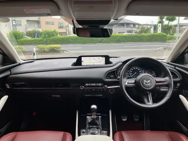 マツダ ＣＸ－３０ 20S 100周年特別記念車 埼玉県 2020(令2)年 1.5万km スノーフレイクホワイトパールマイカ 登録時14206km/6速マニュアル/i-ACTIVSENSE/　・スマートブレーキサポート（SBS）/　・レーンキープアシストシステム（LAS）/　・マツダレーダークルーズコントロール（MRCC）/　・クルージング&トラフィックサポート（CTS）/　・ブラインドスポットモニタリング（BSM）/　・交通標識認識システム（TSR）/　・前後誤発進抑制制御/赤革シート/　・パワーシート（メモリー機能付き）/　・前席シートヒーター/純正メーカーコネクトナビ/　・BOSEサウンド/　・フルセグTV/　・CD/DVD再生/　・Bluetooth接続/　・HDMI/USB端子/360°セーフティパッケージ/　・360°ビューモニター/　・ドライバーモニタリング/　・フロントパーキングセンサー/純正ドライブレコーダー（前後タイプ）/電子パーキングブレーキ/パワーバックドア/LEDヘッドライト/オートハイビーム/アドバンスドキー×2/プッシュスタートボタン/革巻きステアリング/ステアリングヒーター/純正18インチAW/クリアランスソナー/保証書/取扱説明書/ナビ取扱説明書/マツダ整備記録簿（R3.R4.R5.R6）