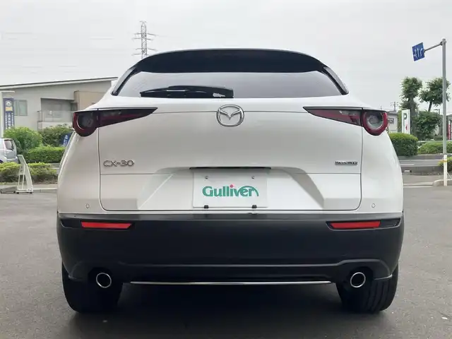 マツダ ＣＸ－３０ 20S 100周年特別記念車 埼玉県 2020(令2)年 1.5万km スノーフレイクホワイトパールマイカ 登録時14206km/6速マニュアル/i-ACTIVSENSE/　・スマートブレーキサポート（SBS）/　・レーンキープアシストシステム（LAS）/　・マツダレーダークルーズコントロール（MRCC）/　・クルージング&トラフィックサポート（CTS）/　・ブラインドスポットモニタリング（BSM）/　・交通標識認識システム（TSR）/　・前後誤発進抑制制御/赤革シート/　・パワーシート（メモリー機能付き）/　・前席シートヒーター/純正メーカーコネクトナビ/　・BOSEサウンド/　・フルセグTV/　・CD/DVD再生/　・Bluetooth接続/　・HDMI/USB端子/360°セーフティパッケージ/　・360°ビューモニター/　・ドライバーモニタリング/　・フロントパーキングセンサー/純正ドライブレコーダー（前後タイプ）/電子パーキングブレーキ/パワーバックドア/LEDヘッドライト/オートハイビーム/アドバンスドキー×2/プッシュスタートボタン/革巻きステアリング/ステアリングヒーター/純正18インチAW/クリアランスソナー/保証書/取扱説明書/ナビ取扱説明書/マツダ整備記録簿（R3.R4.R5.R6）