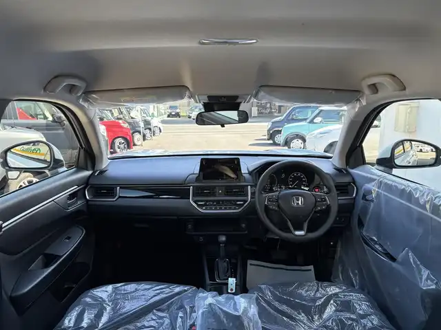 ホンダ ＷＲ－Ｖ X 三重県 2025(令7)年 0.1万km未満 クリスタルブラックパール ♪♪登録済未使用車♪♪/ホンダセンシング/　・衝突軽減ブレーキ(CMBS)/　・踏み間違い衝突軽減システム/　・路外逸脱抑制機能/　・歩行者事故低減ステアリング/　・先行車発進お知らせ/　・標識認識機能/　・オートハイビーム/　・パーキングセンサーシステム/　・アダプティブクルーズコントロール/　・車線維持支援システム/スマートキーx2/プッシュスタート/パドルシフト/LEDヘッドライト/オートライト/ライトレベリング/横滑り防止/ターンミラー/電動格納ミラー/サイドカーテンエアバック