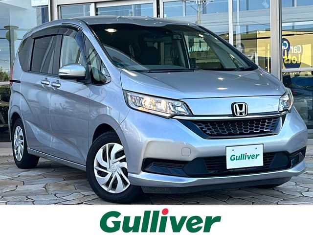 ホンダ フリード B ホンダセンシング 静岡県 2020(令2)年 5.4万km ルナシルバーM ナビ機能/CD/DVD/ラジオ/Bluetooth/ipod/SD/USB/主要装備/・レーダークルーズコントロール　/・ドライブレコーダー　/・スマートキー　/・レーンキープ　/・ＥＴＣ　/・アイドリングストップ　/・両側パワースライドドア　/・スペアキー　/・オートライト　/・衝突軽減システム　/・プッシュスタート/・純正アルミキャップ/・ホンダセンシング/・保証書/・取扱説明書