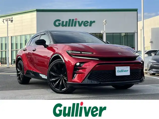 トヨタ クラウン スポーツ Z 愛媛県 2023(令5)年 1万km 赤 メーカーオプション純正ナビ/BT/AM・FM/フルセグTV/ビルトインETC2.0/デジタルインナーミラー/追従型クルーズコントロール/レーンキープアシスト/ブラインドスポットモニター/衝突軽減システム/置くだけ充電/ヘッドライトウォッシャー/電動リアゲート/D+N席パワーシート・シートヒーター・シートクーラー/シートメモリー/本革巻きステアリング/純正アルミホイール/純正フロアマット/フルタイム4WD
